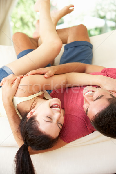 Paar verkehrt herum Sofa Frauen Männer weiblichen Stock foto © monkey_business