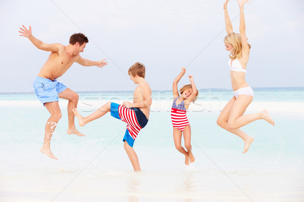Stock fotó: Család · szórakozás · tenger · tengerparti · nyaralás · nő · tengerpart