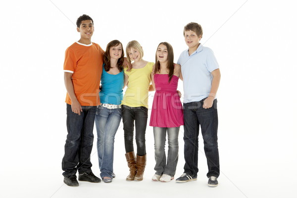 Csoport öt fiatal gyerekek ugrik stúdió Stock fotó © monkey_business
