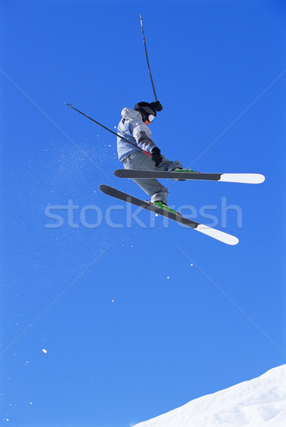 ストックフォト: スキーヤー · ジャンプ · 雪 · 青空 · 休日 · 休暇