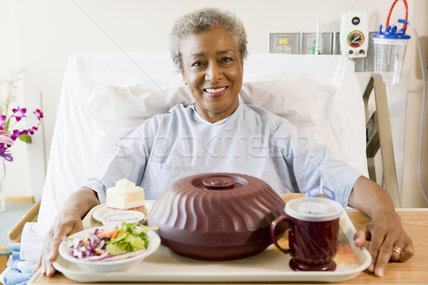 Senior donna seduta letto di ospedale vassoio alimentare Foto d'archivio © monkey_business
