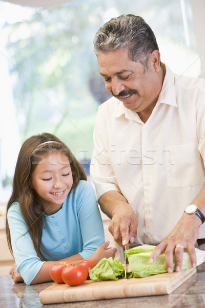 Grandfather And Granddaughter Preparing meal,mealtime Together Stock photo © monkey_business