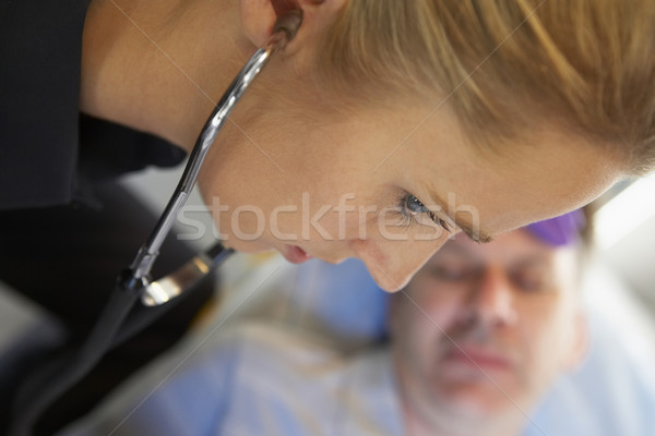 Paramédicaux stéthoscope patient ambulance domaine infirmière [[stock_photo]] © monkey_business