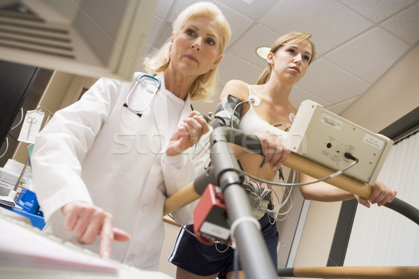 Doctor Monitoring The Heart-Rate Of Patient On A Treadmill Stock photo © monkey_business