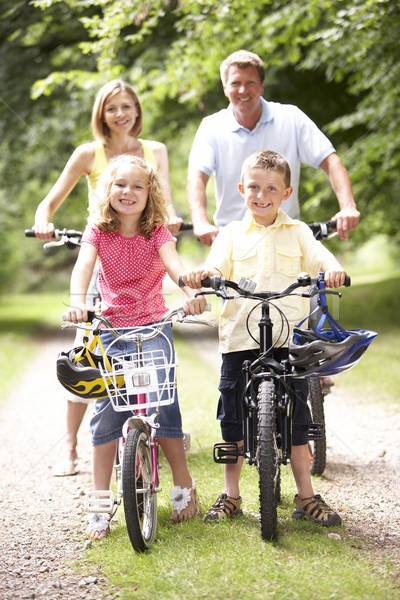 Famille équitation vélos campagne sourire homme [[stock_photo]] © monkey_business