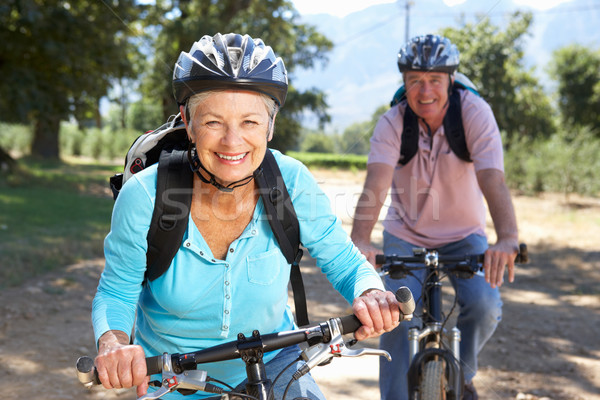 Senior couple on country bike ride Stock photo © monkey_business