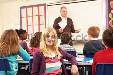 Students and tutor in class Stock photo © monkey_business