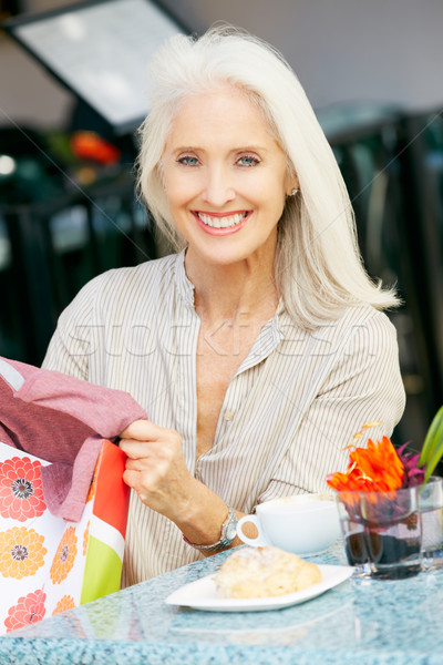 Senior Woman Enjoying Snack At Outdoor Caf Stock photo © monkey_business
