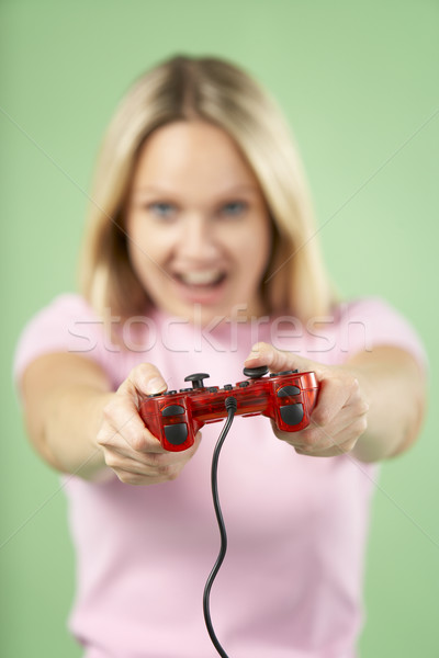 Woman Holding Video Game Controller Stock photo © monkey_business