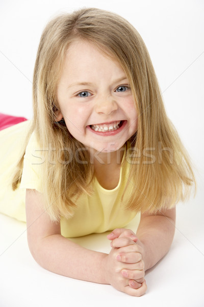 Young Girl Lying On Stomach In Studio Stock photo © monkey_business