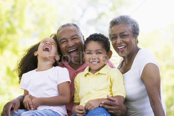 Grootouders lachend kleinkinderen familie kind paar Stockfoto © monkey_business