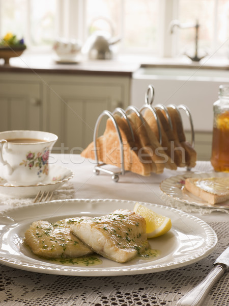 Smoked Haddock with Herb Butter and Toast Stock photo © monkey_business