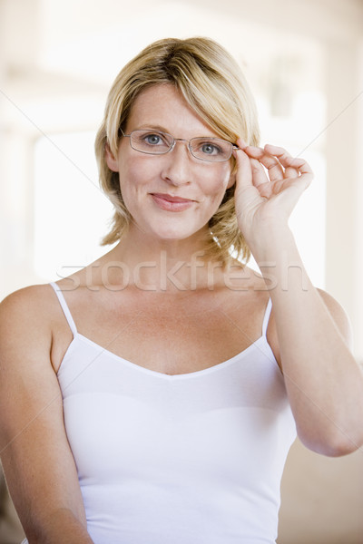 Woman Looking Through New Glasses Stock photo © monkey_business