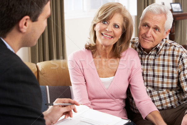 Pareja de ancianos hablar asesor financiero dinero hombre feliz Foto stock © monkey_business