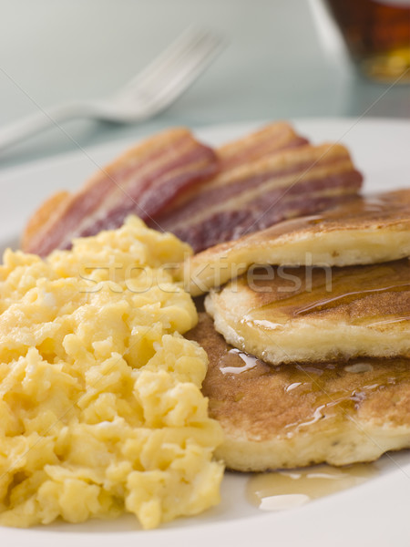 American Pancakes with Crispy Bacon and Scrambled Eggs and Maple Stock photo © monkey_business