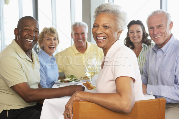 Friends Having Lunch Together At A Restaurant Stock photo © monkey_business