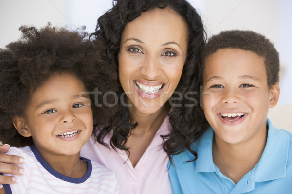 Mulher dois jovem crianças sorrindo sorridente Foto stock © monkey_business