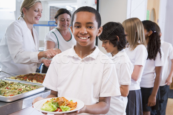 Zdjęcia stock: Uczeń · tablicy · obiad · szkoły