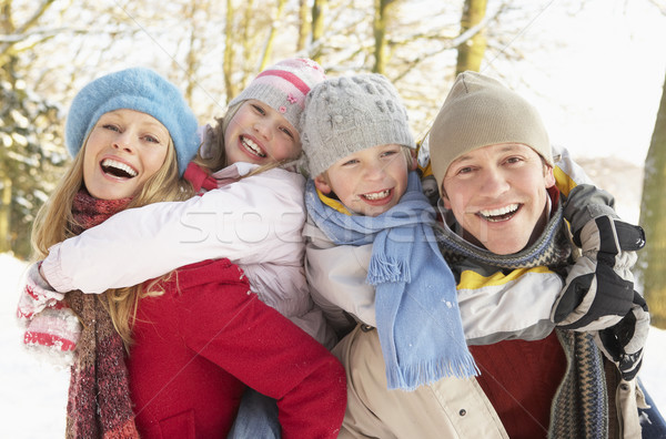 Family Having Fun Snowy Woodland Stock photo © monkey_business