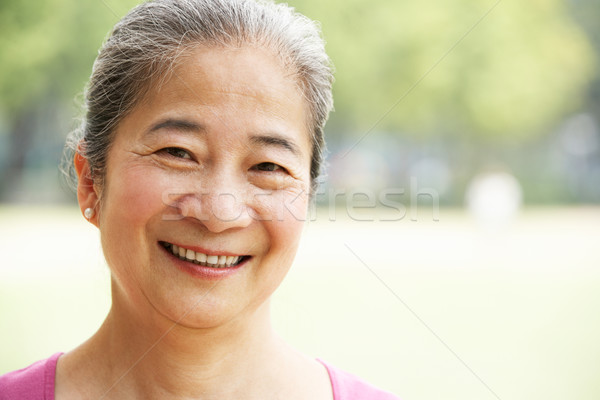 Testa spalle ritratto attrattivo cinese senior Foto d'archivio © monkey_business