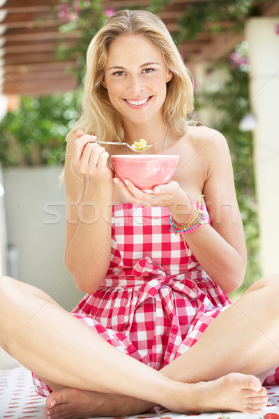 Woman Enjoying Bowl Of Breakfast Cereal Stock photo © monkey_business