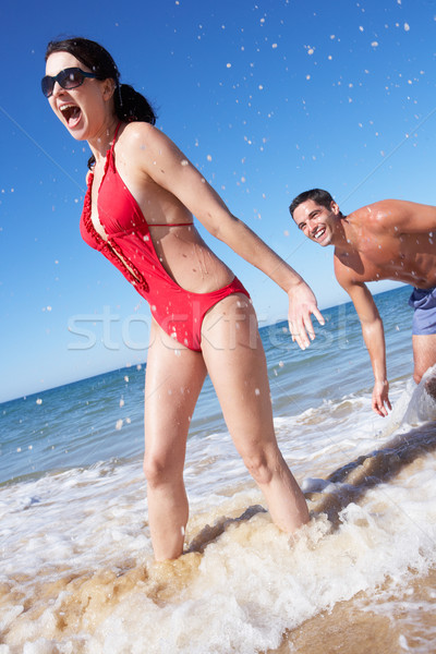 Couple Enjoying Beach Holiday Stock photo © monkey_business