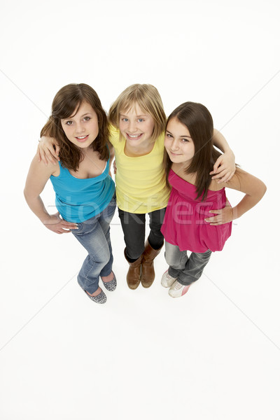 Groupe trois jeunes filles studio fille [[stock_photo]] © monkey_business