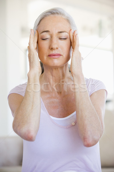 Femeie durere de cap acasă durere bolnav senior Imagine de stoc © monkey_business