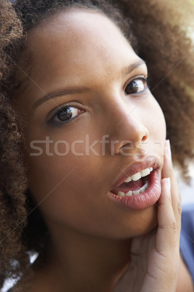 Stock photo: Portrait Of Teenage Girl Looking Shocked