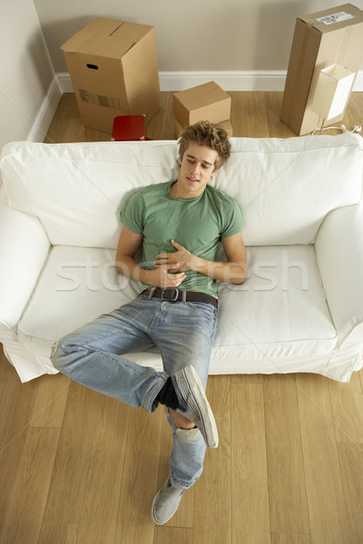 Stock photo: Young Man Moving Into New Home