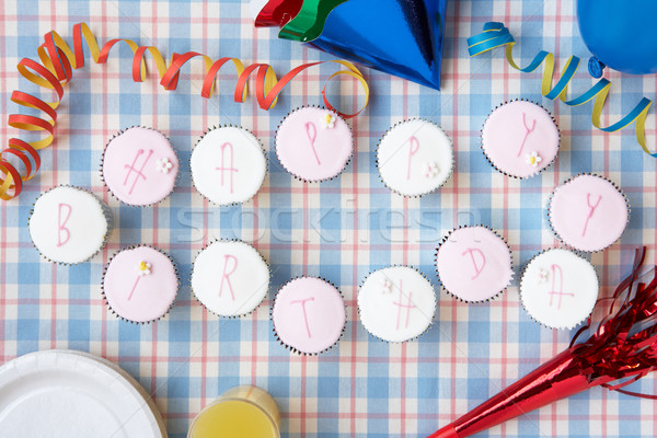 Cupcakes spell out happy birthday Stock photo © monkey_business