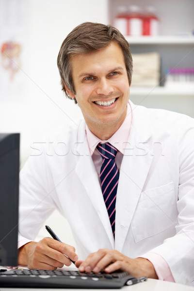 Hospital doctor at desk Stock photo © monkey_business