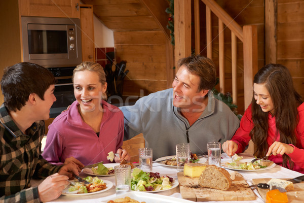 Teenage Family Enjoying Meal In Alpine Chalet Together Stock photo © monkey_business