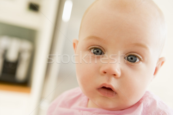 Baby's face in kitchen Stock photo © monkey_business