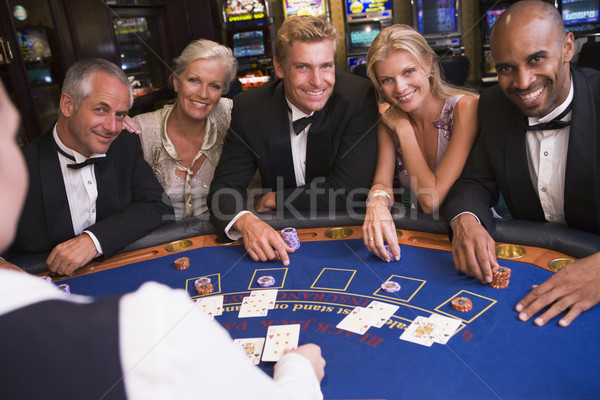 Csoport barátok játszik blackjack kaszinó öt ember Stock fotó © monkey_business