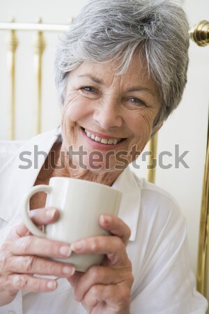 Senior femeie potabilă lapte fericit acasă Imagine de stoc © monkey_business