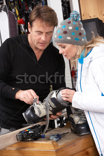 Sales Assistant Helping Advising Female Customer On Ski Boots In Stock photo © monkey_business