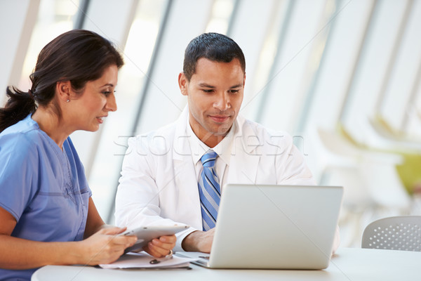 Doctor And Nurse Having Informal Meeting In Hospital Canteen Stock photo © monkey_business