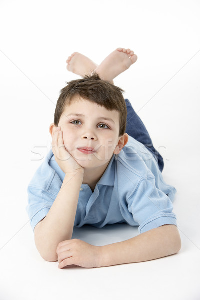 Young Boy Lying On Stomach In Studio Stock photo © monkey_business