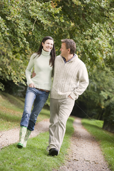 Couple on walk along woodland path Stock photo © monkey_business