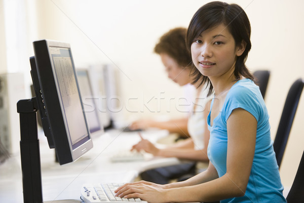 Two women in computer room Stock photo © monkey_business