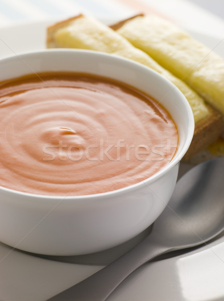 Bowl of Tomato Soup with Cheesy Toasted Soldiers Stock photo © monkey_business