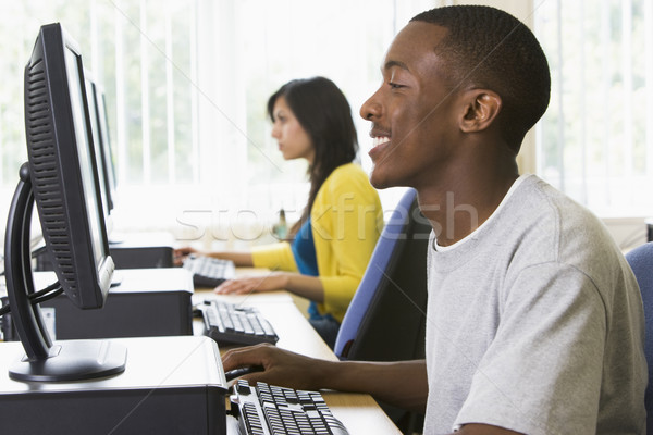 Stock photo: College students in a computer lab
