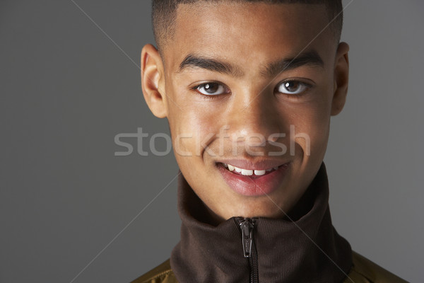 Stock photo: Studio Portrait Of Fashionably Dressed Teenage Boy