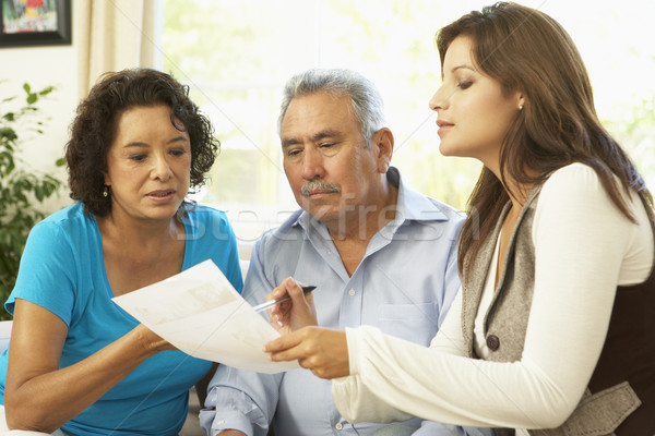 Senior Couple With Financial Advisor At Home Stock photo © monkey_business
