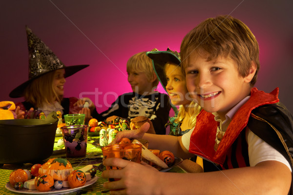 Halloween party with children having fun in fancy costumes Stock photo © monkey_business