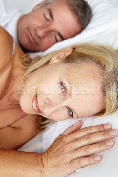 Coppia letto donna sveglio ritratto Foto d'archivio © monkey_business