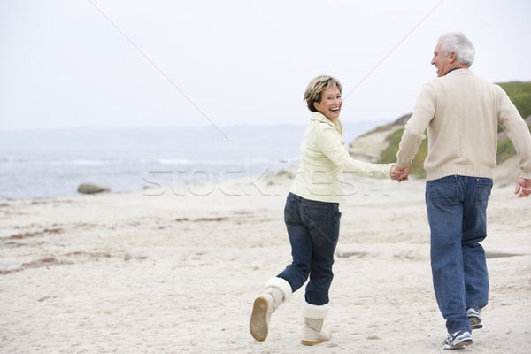 Stock fotó: Pár · tengerpart · kéz · a · kézben · mosolyog · nő · férfi