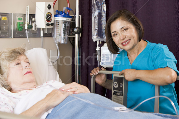 Doctor Checking Up On Senior Woman Patient Stock photo © monkey_business