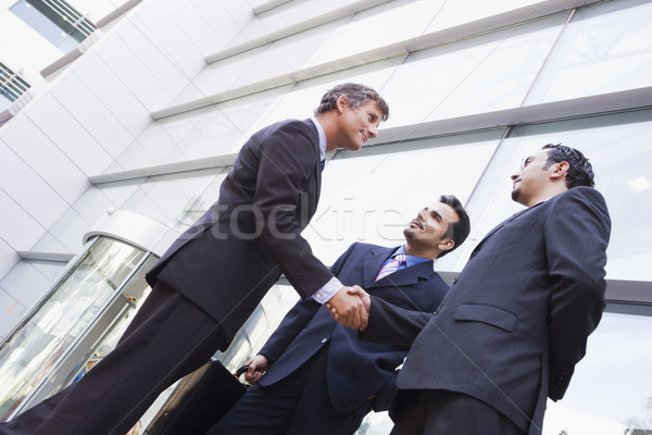 Stock foto: Gruppe · Geschäftsleute · Händeschütteln · außerhalb · Büro · modernen